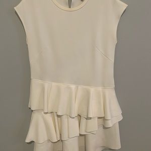 White dress with layering at the bottom